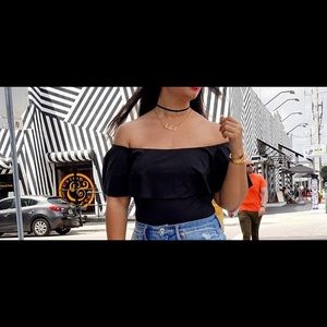 By Egreis off the shoulder body suit. XL Black